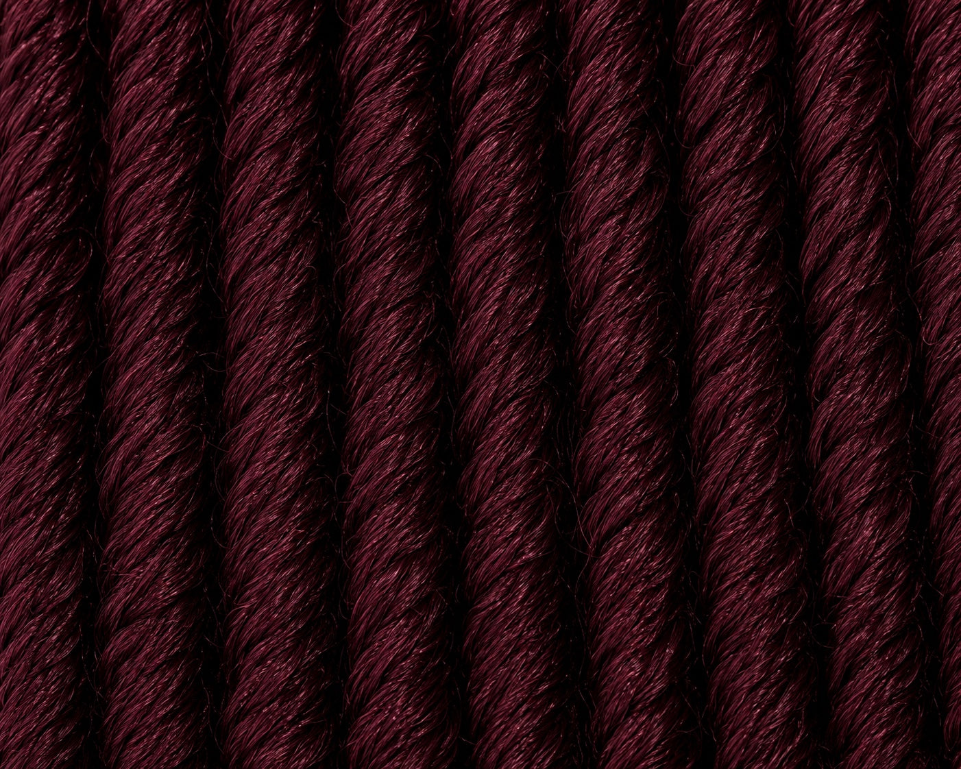 Close-up texture of 3X Soft Bread crochet hair in color 99J