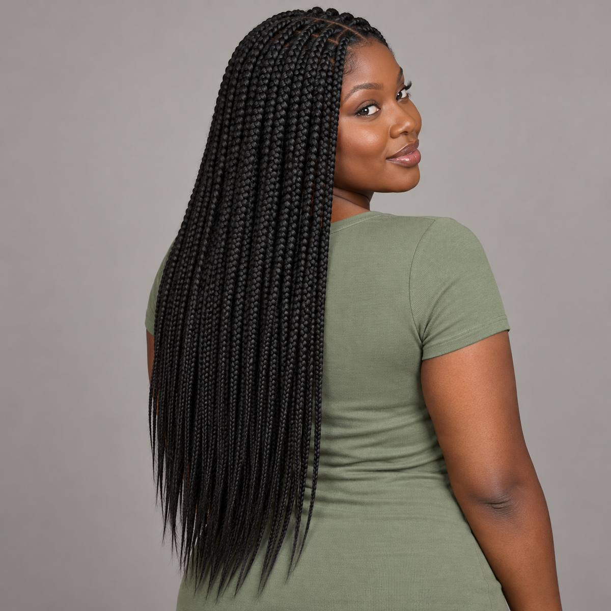 Back view of long, small jet black box braids